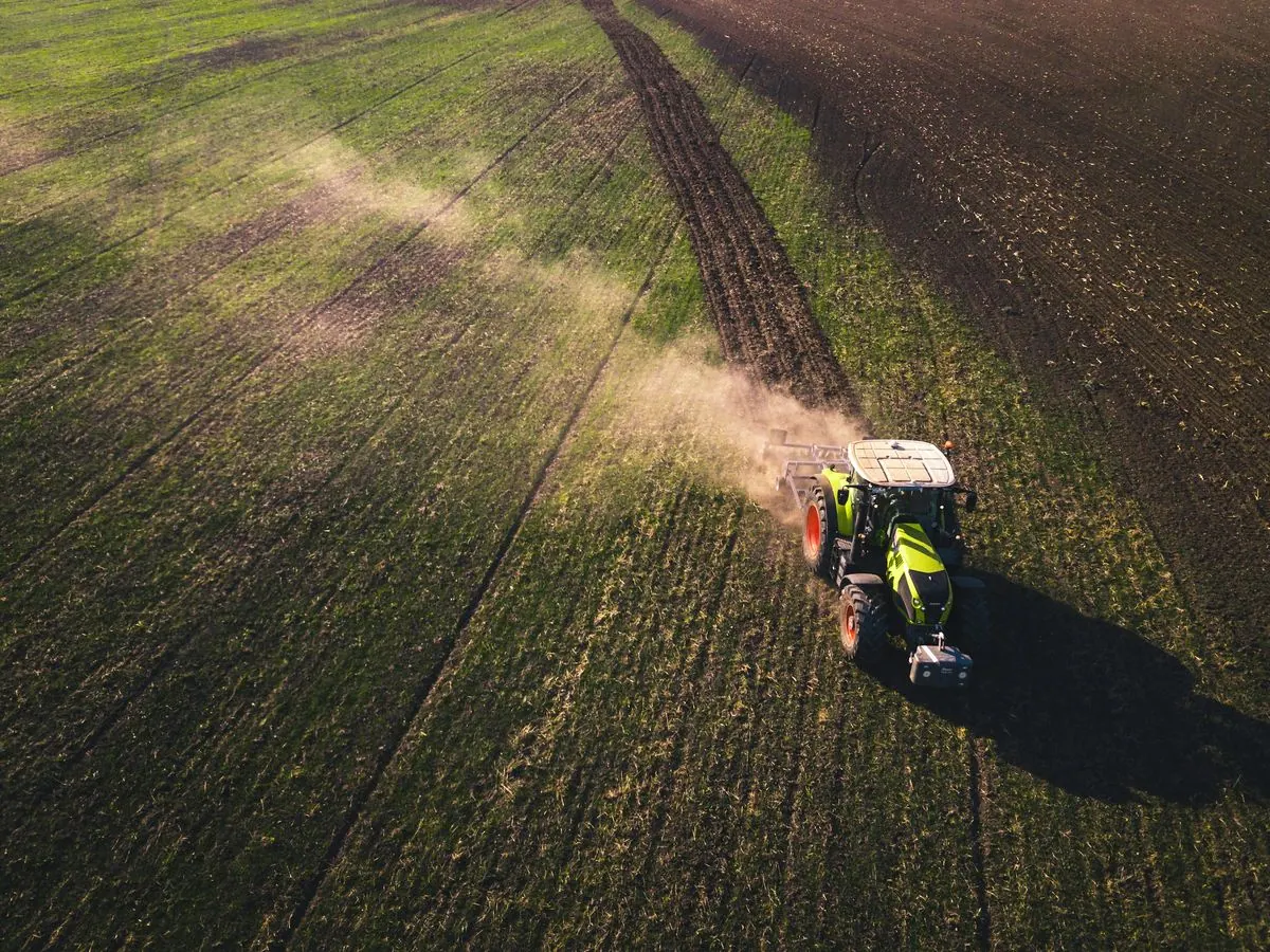Agricultural tractor working in a cultivated field, representing agricultural machinery rental enquiries for farming and rural operations.